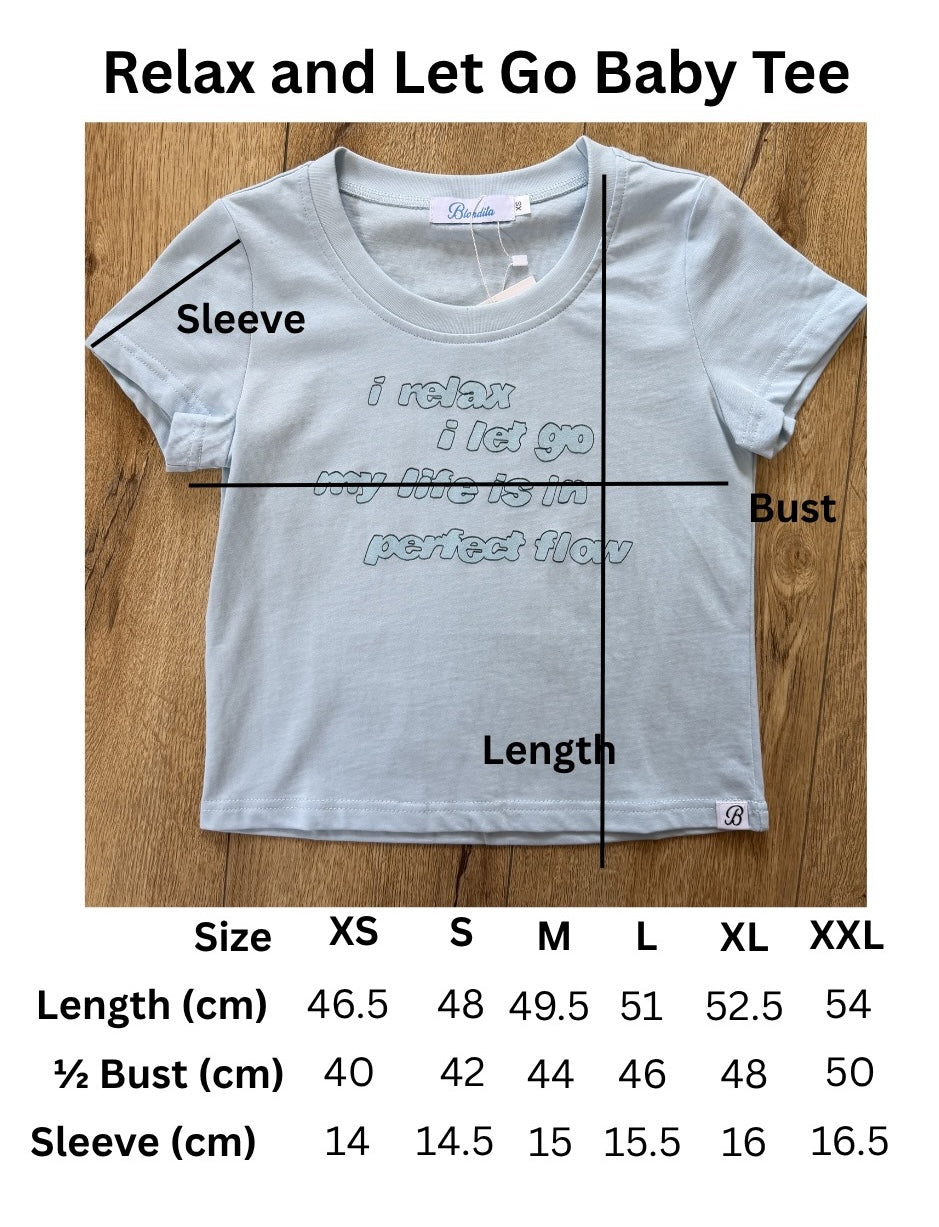 size chart for Light blue baby tee with a quote about relaxing 