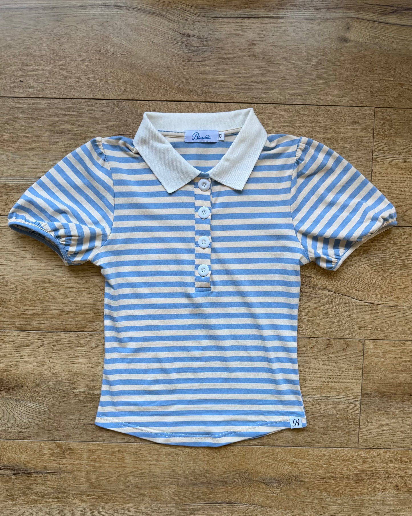 Womens light blue and white stripe polo