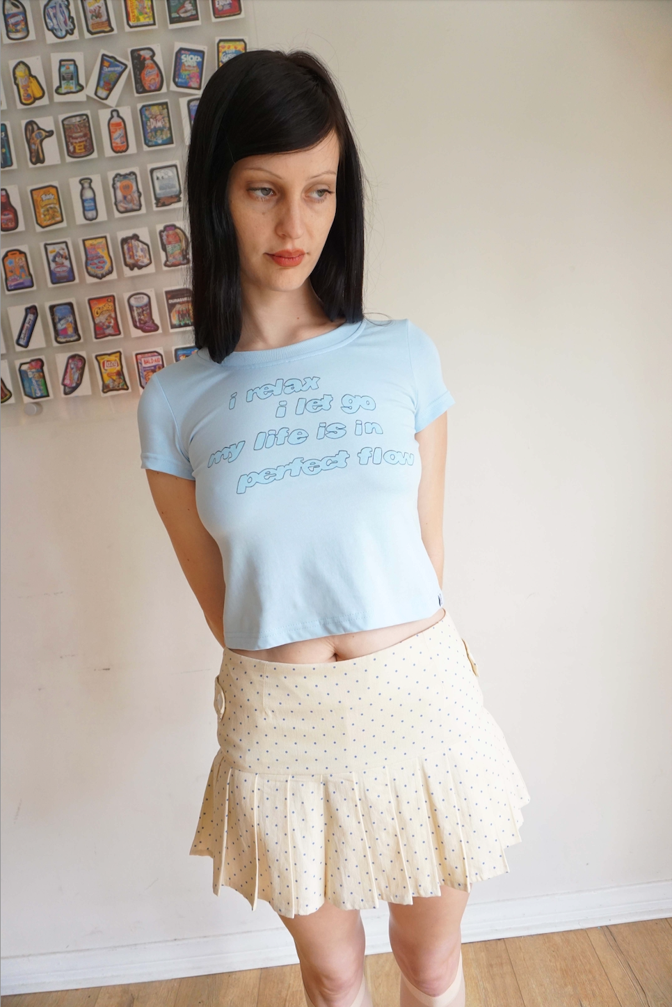Light blue baby tee with a quote about relaxing 